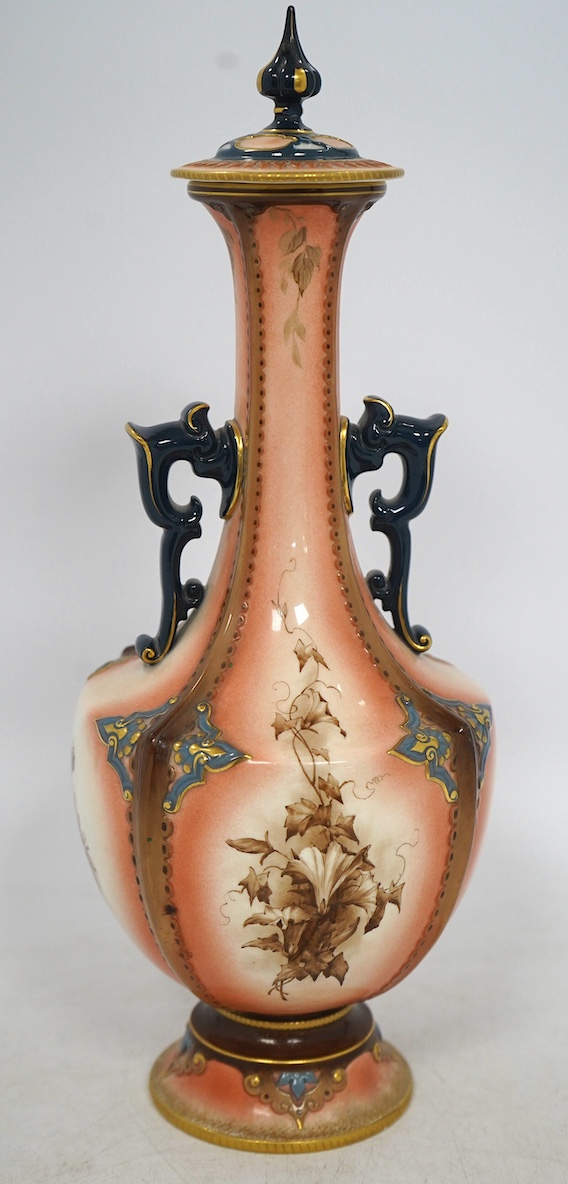 A Hadleys Worcester faience vase and cover, 31cm high. Condition - fair, the pommel on the lid has been broken and reattached